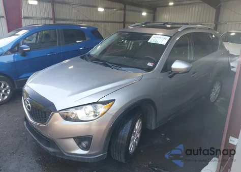 2014 Mazda Cx-5 Touring z USA, uszkodzony, nr VIN JM3KE2CY7E0317859